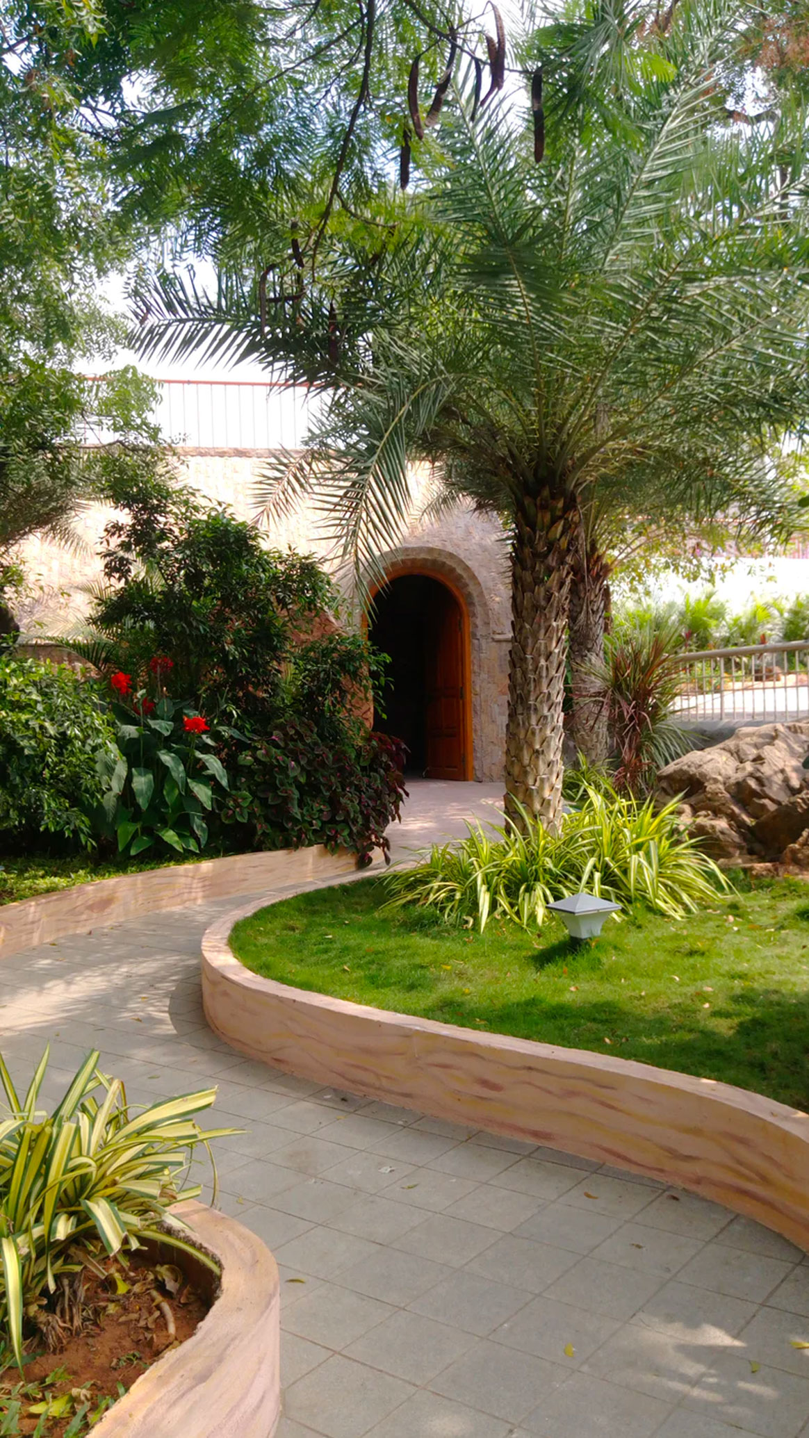 Professional Square Paved Pathway Design & Installation | Honeycutt Landscaping, Inc Expertly constructed square paved winding path by Honeycutt Landscaping, Inc., adding functional and attractive walkways to enhance residential and commercial outdoor spaces. Call (704) 389-0159 today to schedule professional pathway design and installation services with Honeycutt Landscaping, Inc., your trusted local landscaping specialists.